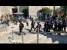 Police charges at Jerusalem's Damascus Gate during Palestinian protest