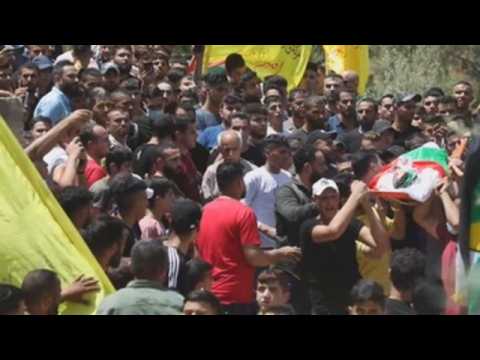 Palestinians hold funeral for teenager shot dead by Israeli soldiers