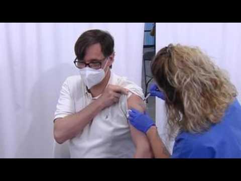 Former Spanish health minister gets coronavirus vaccine