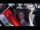 Bashar al-Assad supporters flock to vote at the Syrian embassy in Lebanon