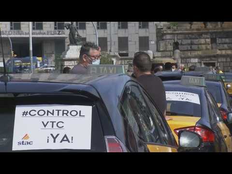 Barcelona taxi drivers protest against ride-sharing companies