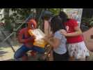 'Spider-Man' surprises Philippines neighborhood with free food
