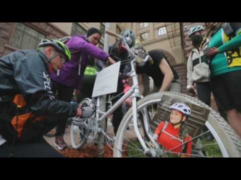 Cyclists pay tribute to a woman who recently died in an accident