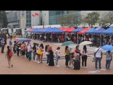 Domestic employees attend mass testing in Hong Kong
