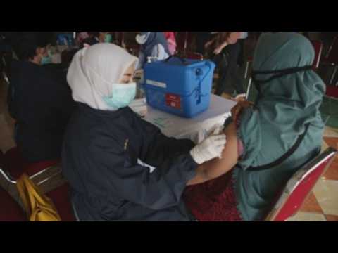 Vaccination drive for teachers in Indonesia