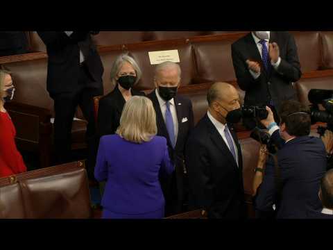 Biden arrives to address Congress on eve of 100th day in office