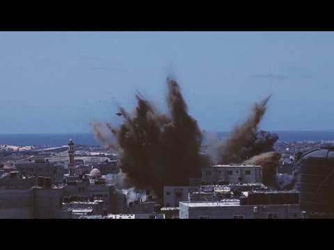 Israeli air strike hits building in southern Gaza Strip