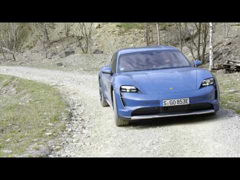 The new Porsche Taycan 4S Cross Turismo in Neptun blue Driving Video