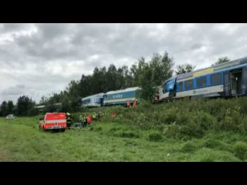 Policemen and firefighters work at train crash site in Czech Republic