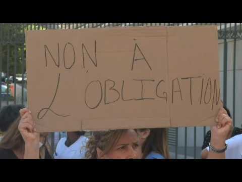 French health care workers protest against mandatory vaccination in Marseille