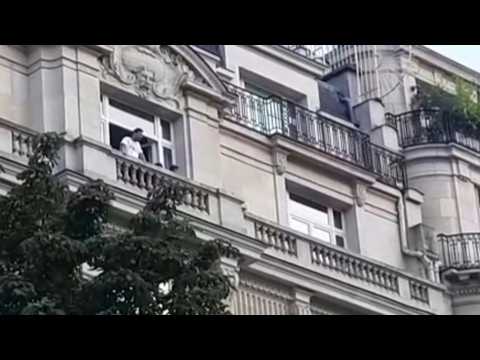 Football: Messi waves to fans from hotel balcony