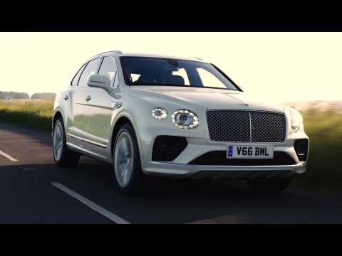 The new Bentley Bentayga Hybrid in Ghost White Driving Video