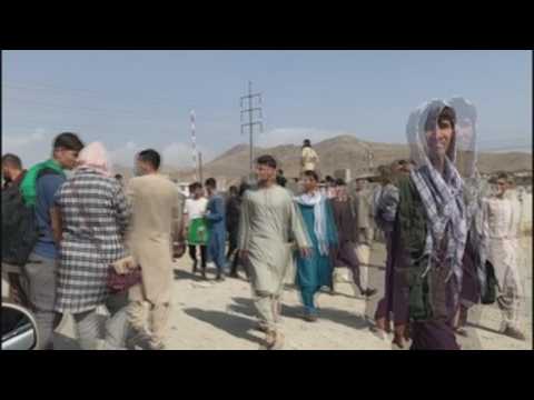 Afghans desperate to flee gather outside Kabul airport