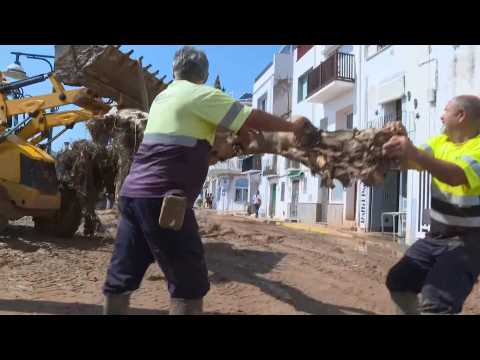 Efforts in Alcanar, north-east of Spain, to remove water and debris after big storms