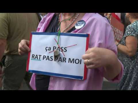 In Paris, anti-vaccine demonstrators gather for eighth Saturday in a row