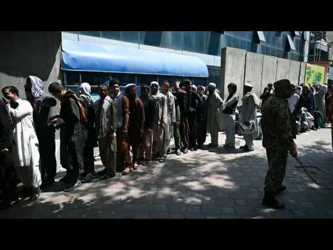 People line up at banks in Kabul
