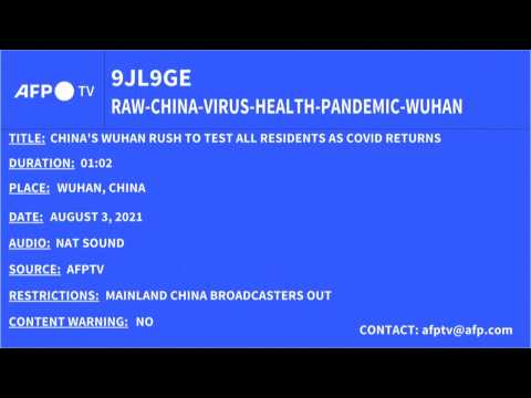 Wuhan tests masses as China reports record daily Covid-19 domestic cases