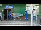 Russia: Helicopter crash survivor arrives at hospital - Label : AFPTV - First images - Category : News