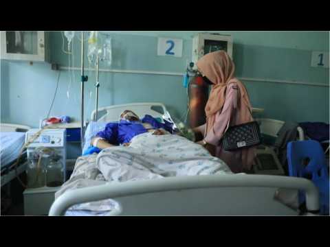 Women activists visit injured Afghan security forces in a Herat hospital