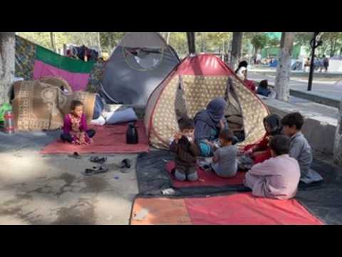 Displaced Afghan families set up temporary shelter in Kabul park