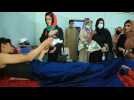 Afghan women activists visit hospitialised anti-Taliban forces