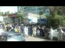 Huge queues oustide Kabul banks to withdraw money as Taliban advance