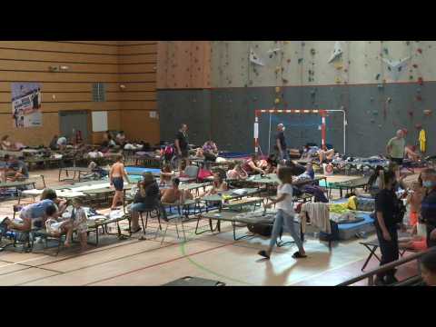 Evacuees find refuge in gym after wildfires in France's south