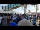 Desperate crowds gather at Kabul airport