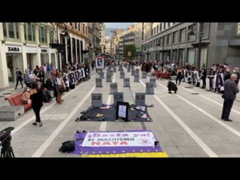 Spanish city of Oviedo covers streets in black to protest against domestic violence