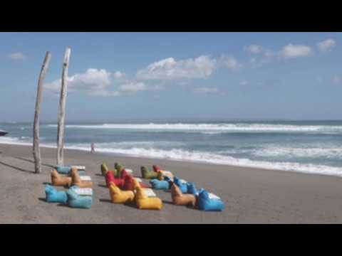 Beaches in Bali remain nearly empty as gov't extends restrictions on community activities