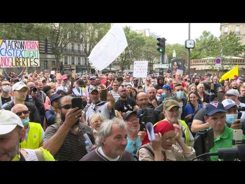 People demonstrate against the health pass in Paris