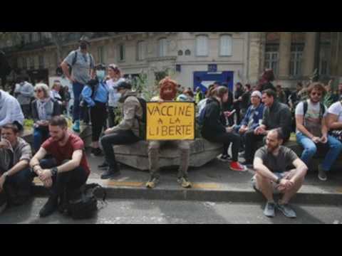 Protests against pandemic measures swell in France