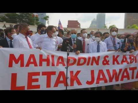 Malaysian opposition members of Parliament hold protest, demand PM resignation