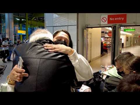 Emotional reunions at Heathrow airport as UK lifts quarantine rules