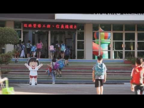 Students in Taiwan return to schools as COVID-19 cases decrease