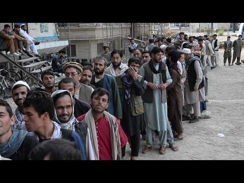 Afghanistan: Long lines outside banks in Kabul