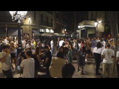 People gather for street drinking in Barcelona