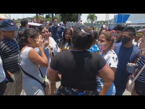 Mother of inmates killed in Guayaquil prison riot wait for her son's body