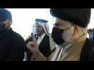 Iraqi Shiite cleric Moqtada al-Sadr casts his ballot as polls open in Najaf