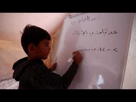 Students return to Idlib classrooms after Covid delays school year