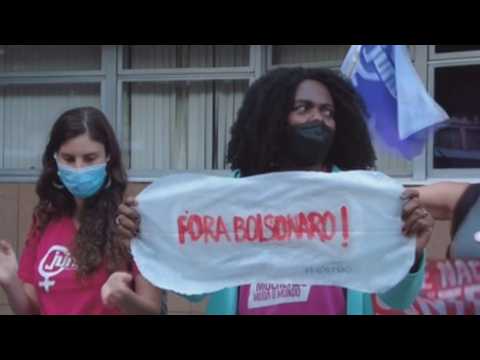 Dozens protest Bolsonaro's veto on free tampon distribution
