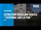 Extinction Rébellion Nantes peint les panneaux publicitaires