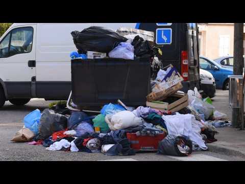 Garbage accumulates in the streets of Mahón (Balearic Islands)