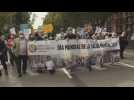 People march in Madrid to mark World Mental Health Day