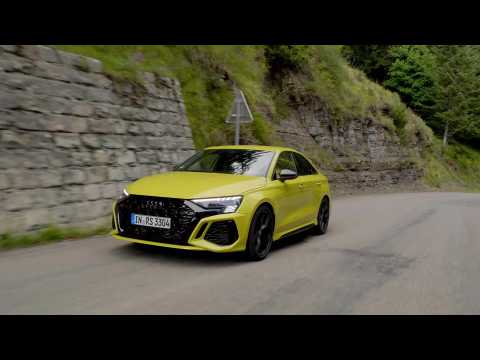 The new Audi RS 3 Sedan in Python Yellow Driving Video