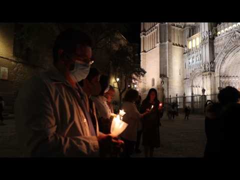 Devotees pray outside Toledo Cathedral  as an act of reparation  after controversial video