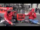 Activists block London street with oil-spattered statue of Boris Johnson