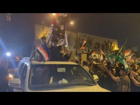 Supporters of Muqtada al-Sadr's party celebrate victory in Iraqi elections