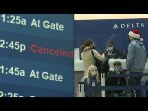Flights canceled in New York as Omicron hits holiday travel
