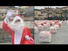 Santa Claus delivers food parcels in Rio favela